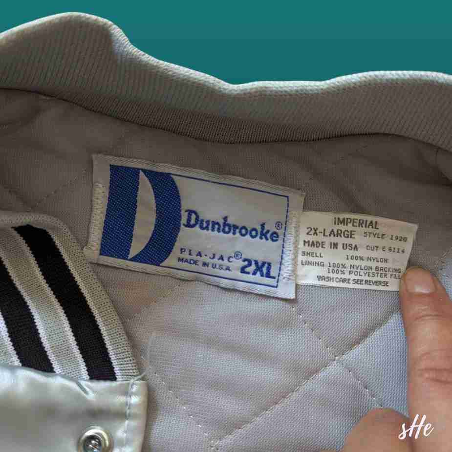 Vintage Ohio State Nylon Bomberjacke | 2XL | Silber-Weiß | Dunbrooke vintage ohio state bomberjacke nylon 2xl silber label etikett